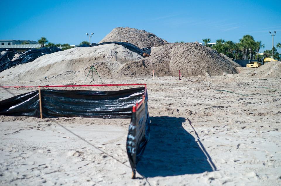 Mounds of sandy soil are seen on site during a groundbreaking ceremony for the new Dolphin Oasis feature at the Gulfarium Marine Adventure Park on Okaloosa Island.