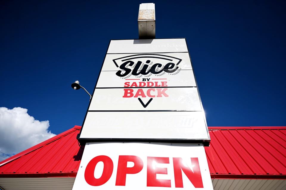 The sign outside the Slice by Saddleback south Lansing location on Thursday, Aug. 11, 2022.