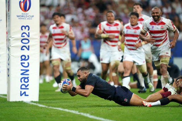 Joe Marchant scores a try during England's win against Japan