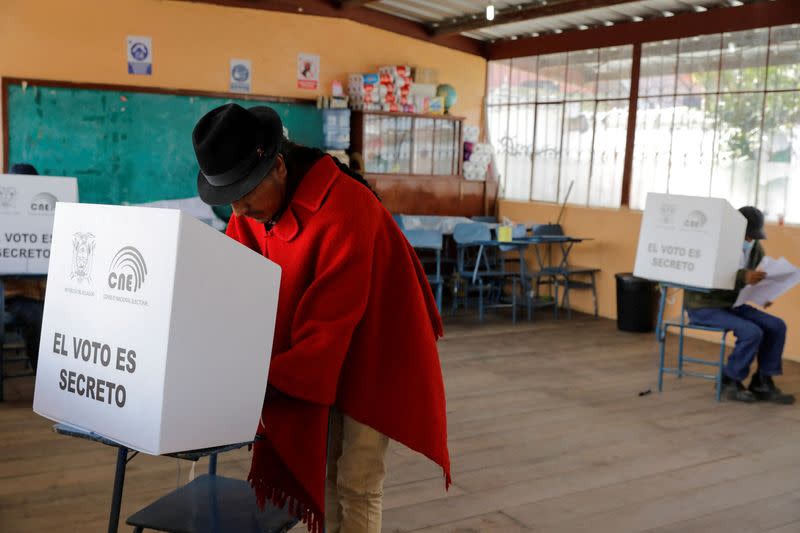 FILE PHOTO: Ecuadoreans cast their votes in constitutional referendum and local elections, in Latacunga