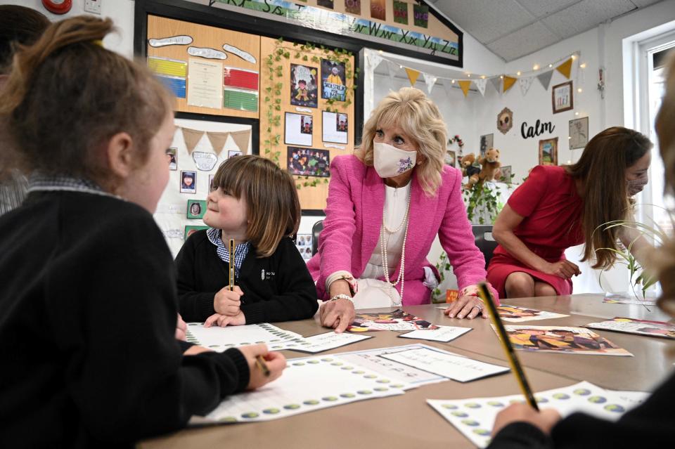 Duchess Kate of Cambridge and first lady Jill Biden chat with children during their visit to Connor Downs Academy in Hayle, Cornwall during the G7 summit on June 11, 2021.