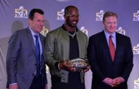 Feb 8, 2016; San Francisco, CA, USA; Denver Broncos coach Gary Kubiak (left), linebacker Von Miller (center) and NFL commissioner Roger Goodell pose after 24-10 victory over the Carolina Panthers during press conference at the Moscone Center. Mandatory Credit: Kirby Lee-USA TODAY Sports