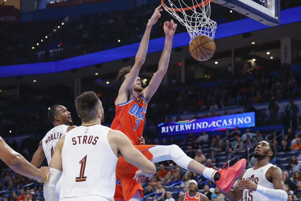 Nov 8, 2023; Oklahoma City, Oklahoma, USA; Oklahoma City Thunder forward Chet Holmgren (7) dunks against the Cleveland Cavaliers during the second half at Paycom Center. Oklahoma City won 128-120. Mandatory Credit: Alonzo Adams-USA TODAY Sports