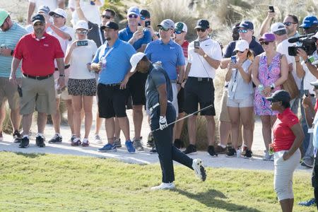 December 2, 2017; New Providence, The Bahamas; Tiger Woods reacts after his shot from the rough on the seventh hole during the third round of the Hero World Challenge golf tournament at Albany. Mandatory Credit: Kyle Terada-USA TODAY Sports