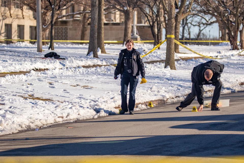 Police investigate a shooting outside of East High School in Des Moines on March 7, 2022.