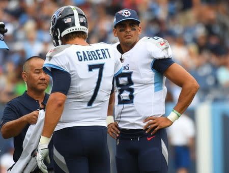 Sep 16, 2018; Nashville, TN, USA; Tennessee Titans quarterback Marcus Mariota (8) and Tennessee Titans quarterback Blaine Gabbert (7) in a huddle during the first half against the Houston Texans at Nissan Stadium. Mandatory Credit: Christopher Hanewinckel-USA TODAY Sports