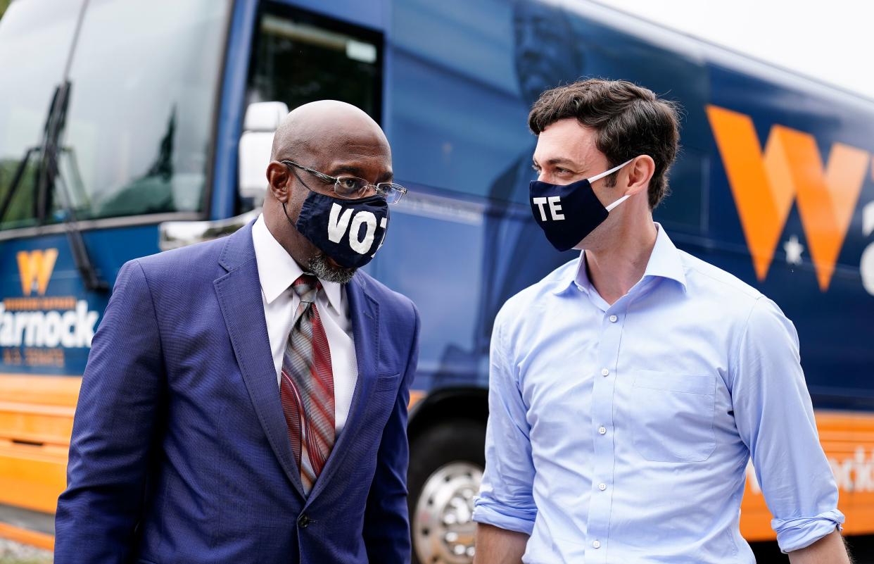 Democrats Raphael Warnock and Jon Ossoff are competing in Jan. 5 runoff elections that will determine control of the Senate. (Photo: Brynn Anderson/Associated Press)