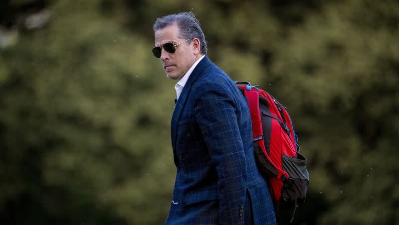 Hunter Biden, the son of President Joe Biden, walks from Marine One upon arrival at Fort McNair, Sunday, June 25, 2023, in Washington. The Bidens were returning from Camp David. Hunter Biden is set to be deposed on Thursday, June 29, 2023, in a defamation lawsuit.