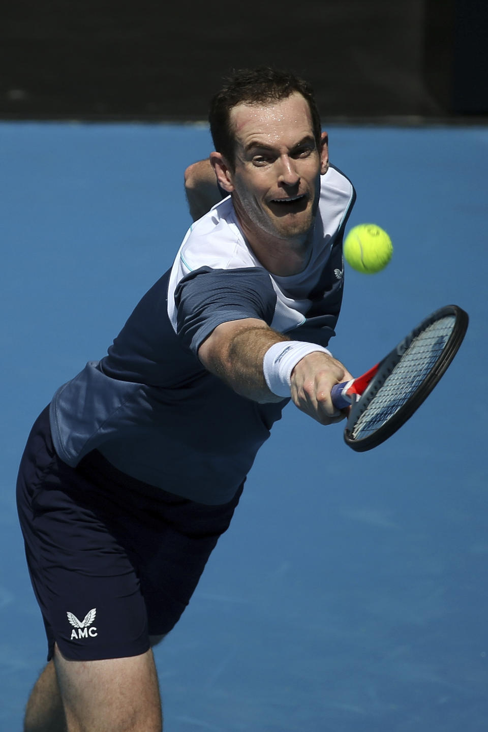 Andy Murray of Britain warms up in a practice session on John Cain Arena at Summer Set tennis tournament ahead of the Australian Open in Melbourne, Australia, Wednesday, Jan. 5, 2022. (AP Photo/Hamish Blair)