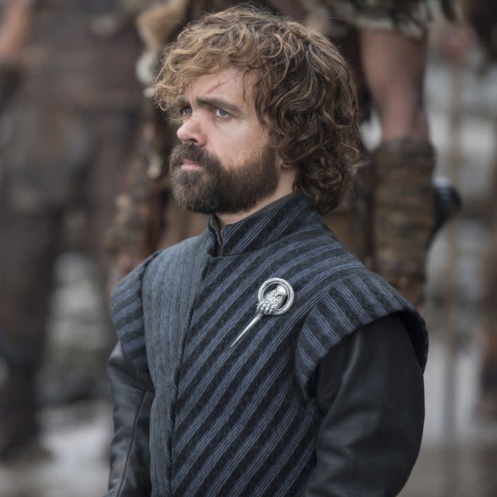 Peter Dinklage wearing his Hand of the Queen pin