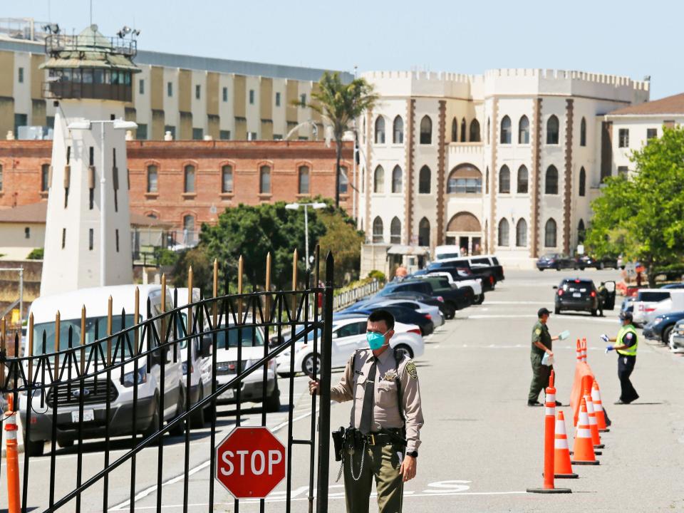 san quentin prison gate close coronavirus guard