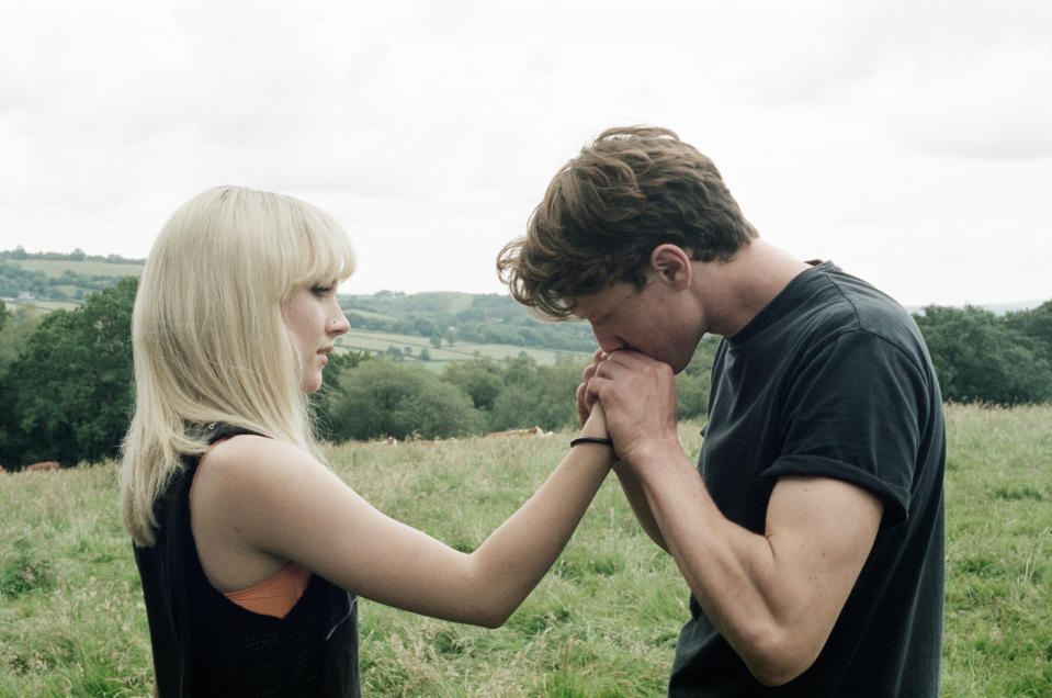 This image released by Magnolia Pictures shows Saoirse Ronan, left, and George MacKay in a scene from "How I Live Now." (AP Photo/Magnolia Pictures)