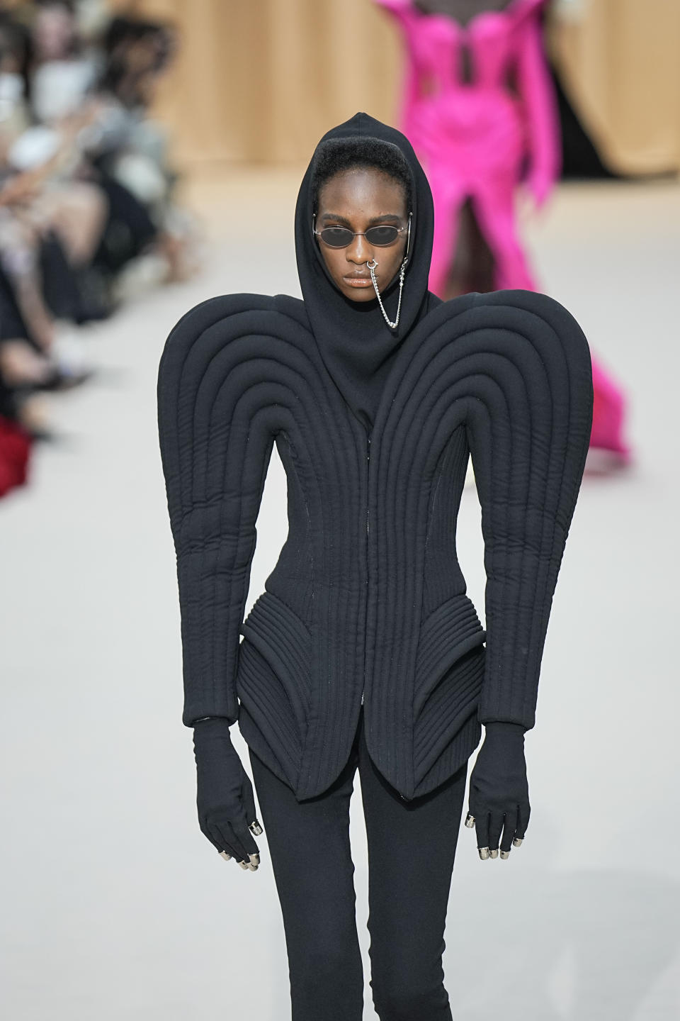 A model wears a creation as part of Jean Paul Gaultier's Haute Couture Fall/Winter 2022-2023 fashion collection presented Wednesday, July 6, 2022 in Paris. (AP Photo/Michel Euler)