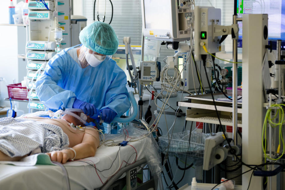  A doctor tends to a patient on the Covid-19 intensive care unit at University Hospital Leipzig in Leipzig, Germany. 