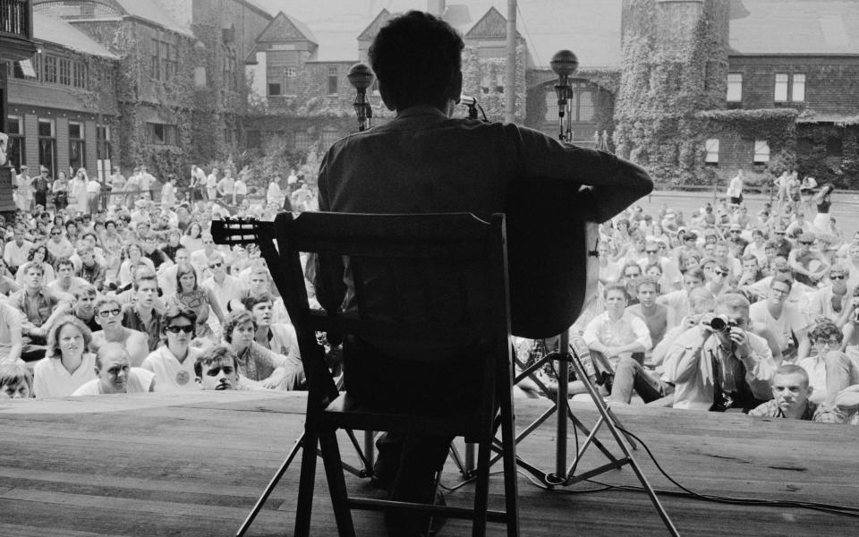 Bob Dylan at Newport in 1963 - Rowland Scherman/Getty Images