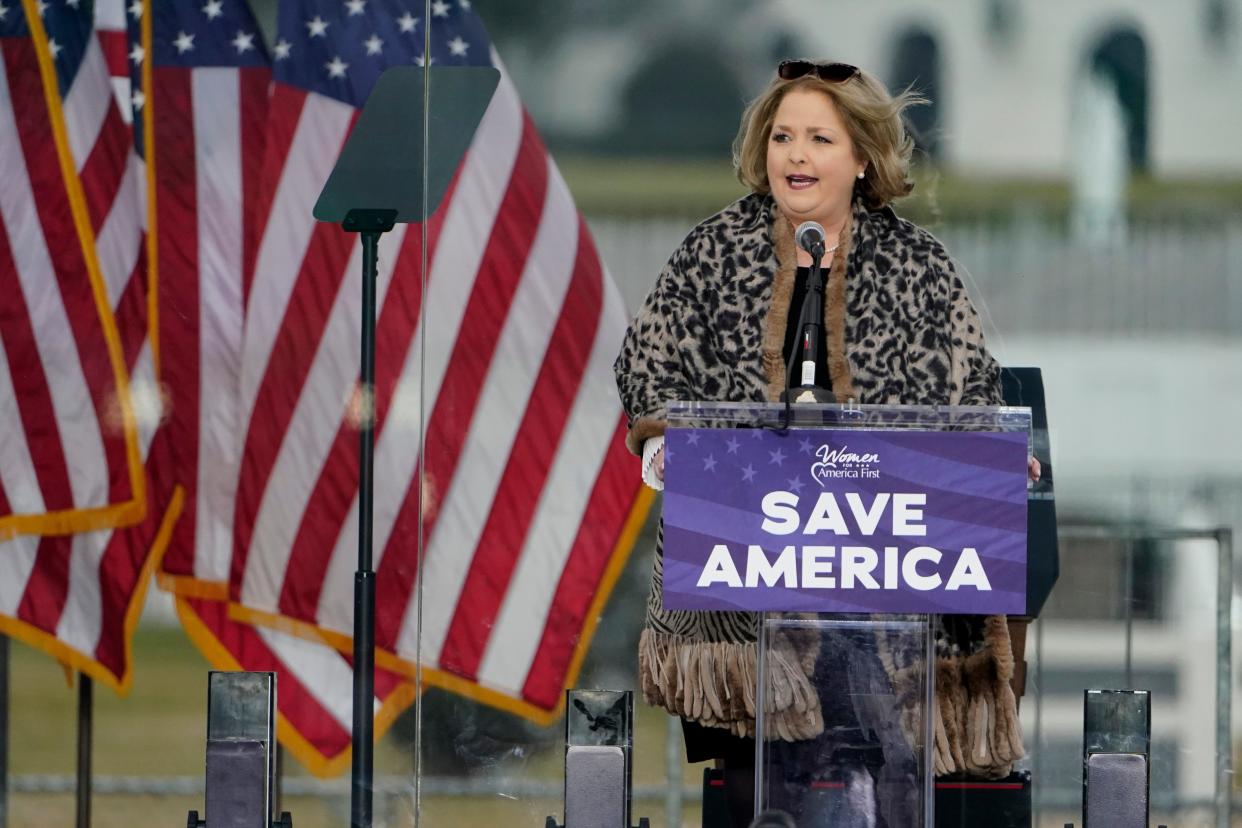 In this Wednesday, Jan. 6, 2021 file photo Amy Kremer, chairwoman of Women for America First, speaks in Washington, at a rally in support of President Donald Trump.