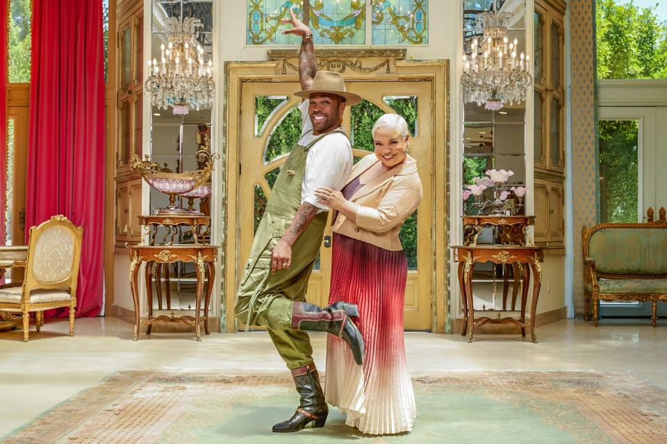 Kim and Todrick posing in the French Luxury Mansion, as seen on Battle of the Bling, season 1