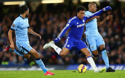 Loic Remy of Chelsea and Fernandinho of Manchester City battle for the ball during the Barclays Premier League match between Chelsea and Manchester City at Stamford Bridge on January 31, 2015 in London, England - Credit: Getty Images