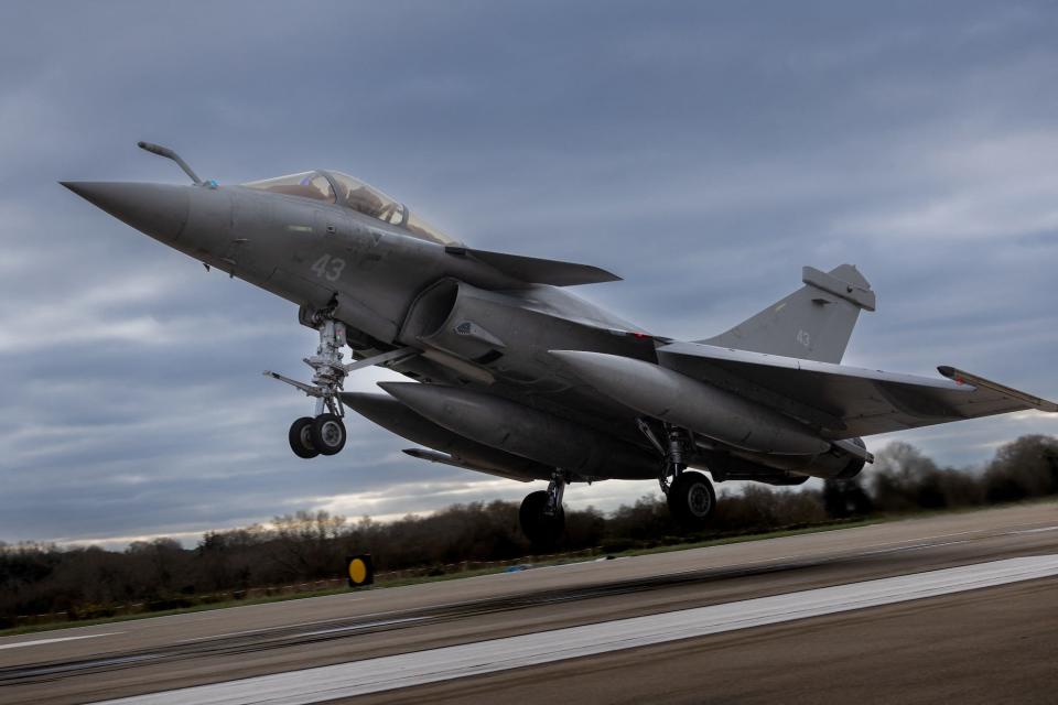 The French multirole fighter Rafale F3R Marine lands on the tarmac of the Lann-Bihoue French Navy airbase in western France on January 12.