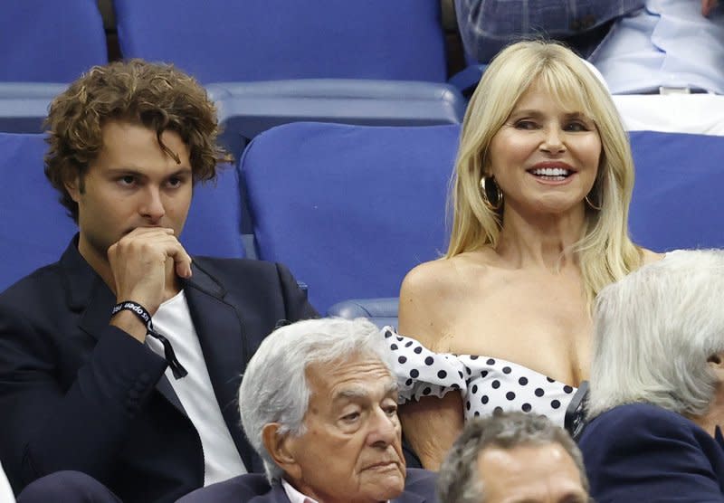 Christie Brinkley and her son Jack watch Casper Ruud of Norway against Carlos Alcaraz of Spain in the Men's Finals of the 2022 U.S. Open Tennis Championships at Arthur Ashe Stadium at the USTA Billy Jean King National Tennis Center in New York City on September 11, 2022. The model turns 70 on February 2. File Photo by John Angelillo/UPI.