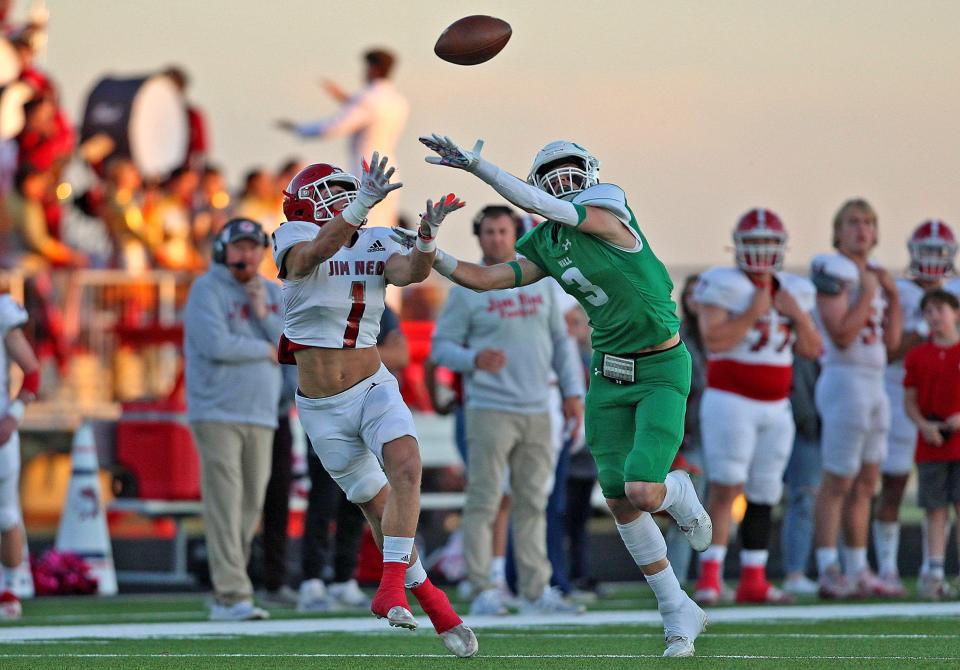 Braden Lewis (1) reaches for a pass for Jim Ned during a game against Wall on Friday, Oct. 15, 2021.