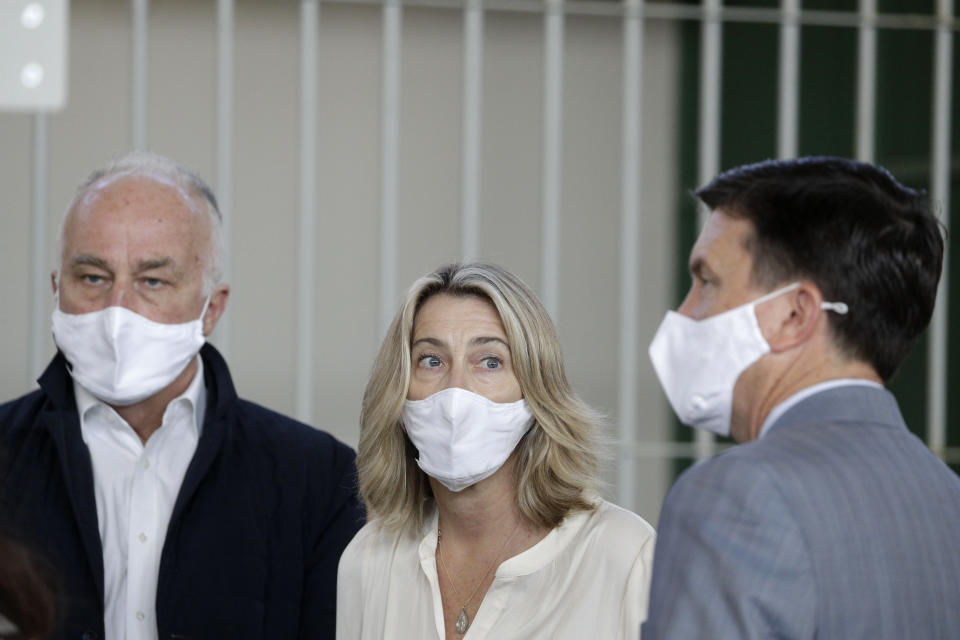 In this photo taken on May 5, 2021, Ethan Elder, left, and his wife Leah Lynn Elder, parents of Finnegan Lee Elder, and the Elder family attorney Craig Peters, right, are in the courtroom for the trial in which their son and his co-defendant Gabriel Natale-Hjorth are are facing murder charges for killing Italian Carabinieri paramilitary police officer Mario Cerciello Rega, in Rome. When prosecutors asked for indictments of two American teenagers for the fatal stabbing of an Italian Carabinieri paramilitary officer, they described the pair as being in cahoots from start to finish, even though only one of the defendants actually wielded the knife in what their lawyers steadfastly contended was in self-defense. When their trial ended, more than 14 months later, the jury’s verdicts embraced the prosecutors’ contentions, convicting both on all charges and sentencing them to life imprisonment. (AP Photo/Gregorio Borgia)