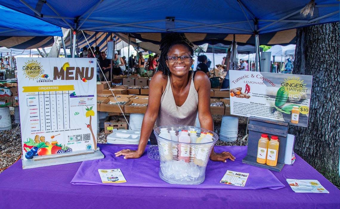 Entrepreneur Dasha Bostic has been coming to the market since she was eight. She now sells her own brand of ginger juices to market patrons, which has been her dream since she was a teenager. Saturday, August 12, 2023.