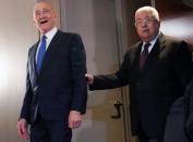 Palestinian president Mahmud Abbas (right) and former Israeli prime minister Ehud Olmert meet reporters after a UN Security Council session on US President Donald Trump's Middle East plan