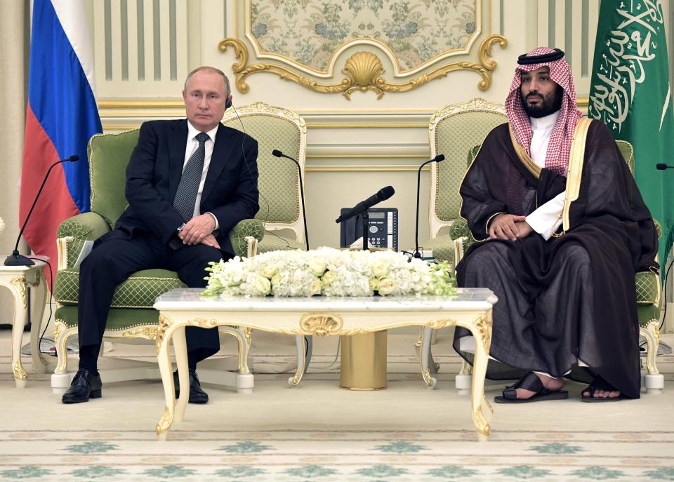 Putin and Saudi Arabia’s crown prince are pictured during a meeting in Riyadh, Saudi Arabia in October 2019 (REUTERS)