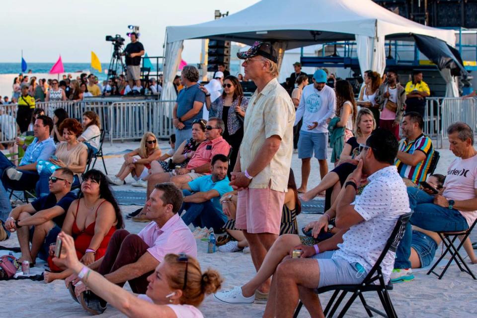 People watch live musical performances during Miami Beach Live International Music Weekend in Miami Beach, Florida, on Saturday, March 19, 2022.