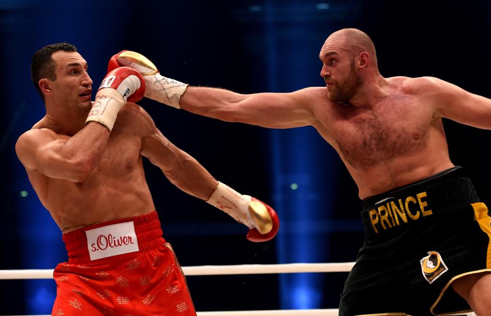 Tyson Fury (R) dethroned Wladimir Klitschko in a 12-round decision to become world heavyweight champion. (Getty Images)