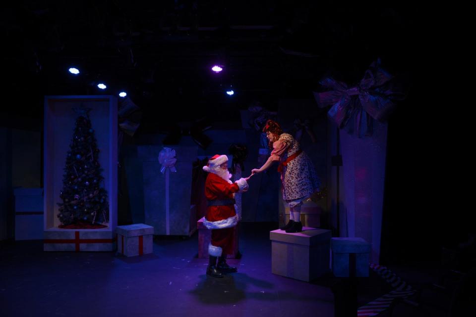 David Turentine and Samantha Bonzi appear as Santa and Eleanor in the 2019 Chicago world premiere production of "Eleanor's Very Merry Christmas Wish — The Musical." Bonzi reprises the role for The GhostLight Theatre's production of the musical from Nov. 26 to Dec. 11, 2022, at the theater in Benton Harbor.
