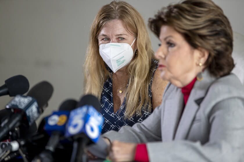 LOS ANGELES, CA - NOVEMBER 17, 2021: Attorney Gloria Allred, announces a new lawsuit filed on behalf of her client Script Supervisor Mamie Mitchell, left, alleging new allegations on the tragic shooting on the set of the movie Rust which killed Director of Photography Halyna Hutchins on November 17, 20201 in Los Angeles, California. (Gina Ferazzi / Los Angeles Times)