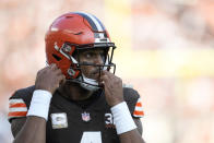 Cleveland Browns quarterback Deshaun Watson (4) adjusts his helmet during the second half of an NFL football game against the Arizona Cardinals Sunday, Nov. 5, 2023, in Cleveland. (AP Photo/Sue Ogrocki)