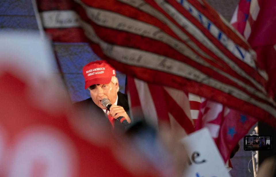 Attorney Lin Wood fires up supporters during a “Stop the Steal” rally in Alpharetta, Ga., Wednesday, Dec. 2, 2020.