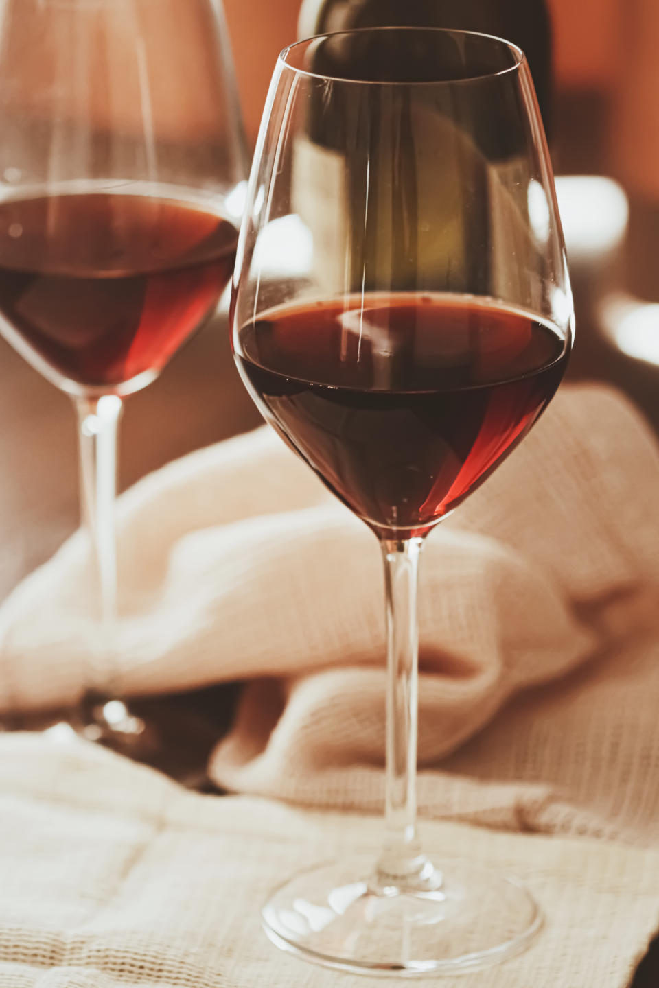 Close-up of wineglasses containing red wine