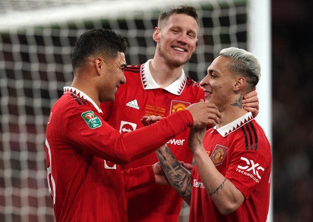 Casemiro, Wout Weghorst and Antony celebrate together