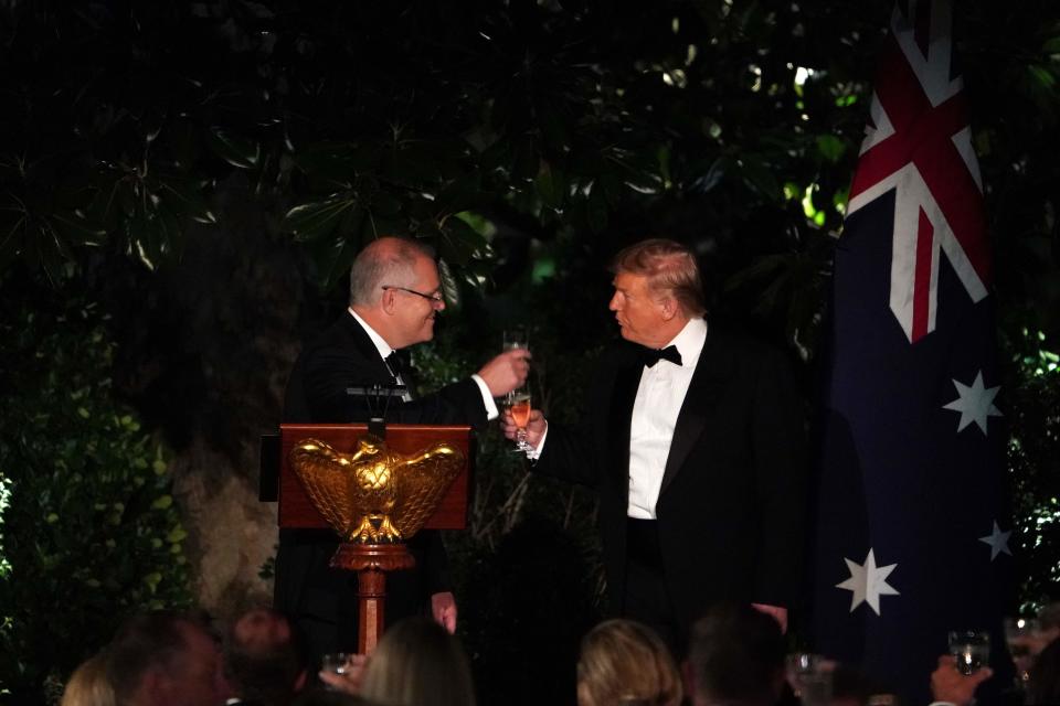 President Donald Trump and Australian Prime Minister Scott Morrison toast during an Official Visit with a State Dinner at the Rose Garden of the White House in Washington, DC, September 20, 2019.