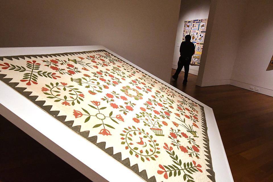 The Work of Their Hands: American Quilt making will be on display at the Cameron Art Museum until Oct. 20 in Wilmington. CAM Cafe is hosting a four-course wine dinner with dishes inspired by the art.