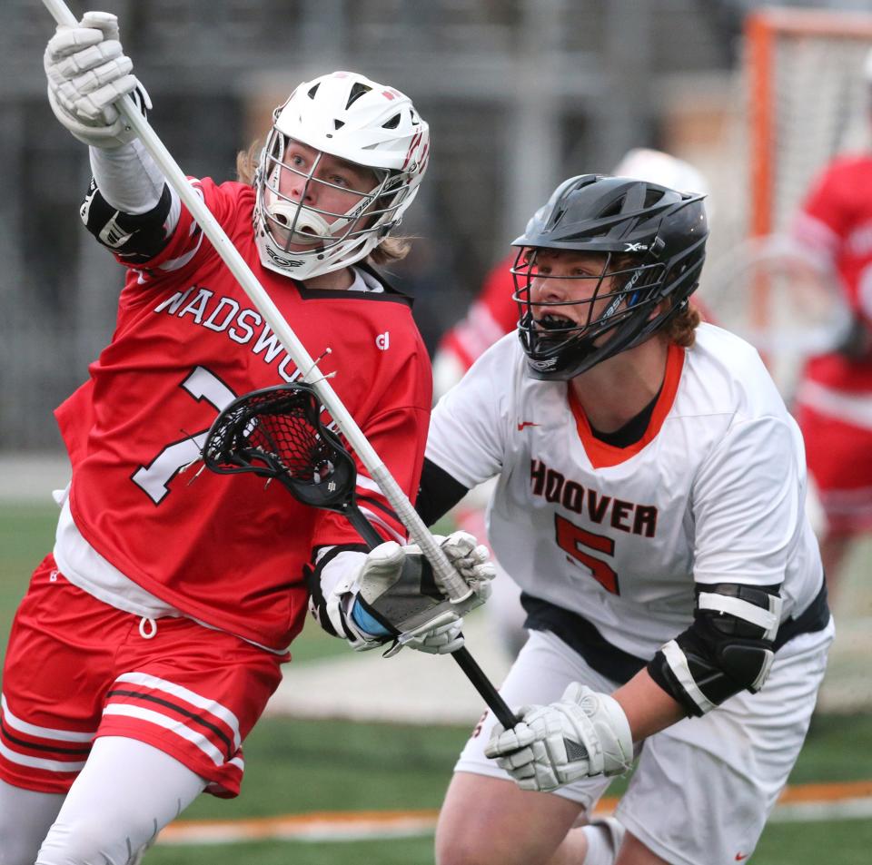 Drew Logan, right, of Hoover guards Maverick Blackburn, left, of Wadsworth during their game at Hoover on Friday, April 1, 2022. 