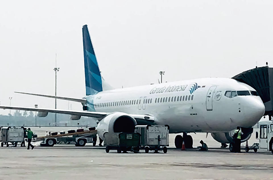 This picture taken on May 15, 2018 shows a Garuda Indonesia Boeing 737 Max 8 at Jakarta International airport in Jakarta. - Indonesia's national carrier Garuda will call off a multi-billion-dollar order for 49 Boeing 737 Max 8 jets after two fatal crashes involving the plane, the company said, in what is thought to be the first formal cancellation for the model. (Photo by IHWAN IDAMIN HARAHAP / AFP) (Photo credit should read IHWAN IDAMIN HARAHAP/AFP/Getty Images)