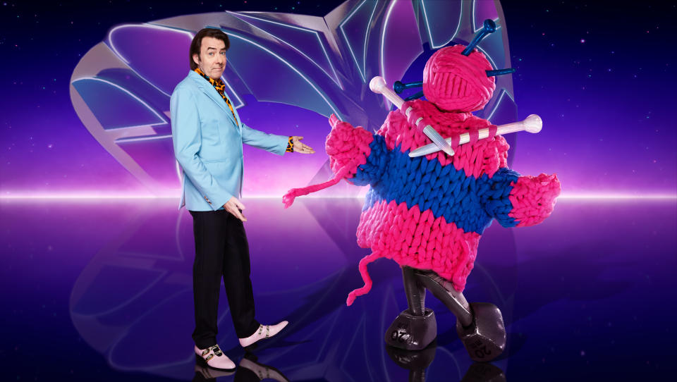This image and the information contained herein is strictly embargoed until 20.00 Sunday 18th December 2022

From Bandicoot TV

The Masked Singer: SR4 on ITV1 and ITVX

Pictured: Jonathan Ross and Knitting.

This photograph is (C) ITV Plc/Bandicoot TV and can only be reproduced for editorial purposes directly in connection with the programme or event mentioned above, or ITV plc. Once made available by ITV plc Picture Desk, this photograph can be reproduced once only up until the transmission [TX] date and no reproduction fee will be charged. Any subsequent usage may incur a fee. This photograph must not be manipulated [excluding basic cropping] in a manner which alters the visual appearance of the person photographed deemed detrimental or inappropriate by ITV plc Picture Desk.  This photograph must not be syndicated to any other company, publication or website, or permanently archived, without the express written permission of ITV Picture Desk. Full Terms and conditions are available on the website www.itv.com/presscentre/itvpictures/terms

For further information please contact:
james.hilder@itv.com
