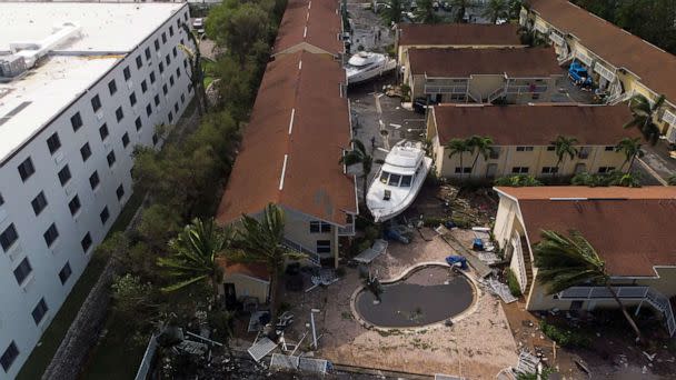 PHOTO: Damaged boats are seen amid a downtown condominium after Hurricane Ian caused widespread destruction, in Fort Myers, Florida, Sept. 29, 2022. (Marco Bello/Reuters)