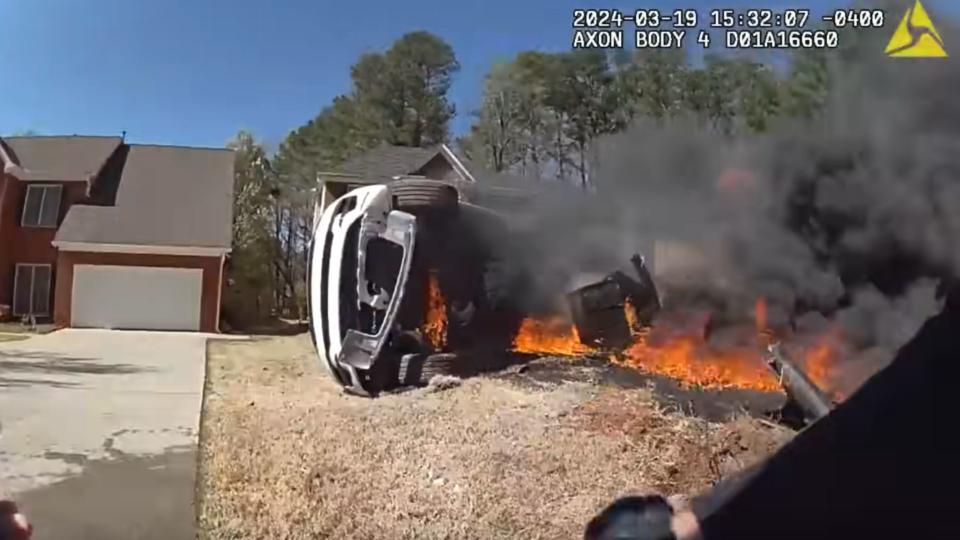 Watch Police Rescue A Drunk Driver From Her Burning Range Rover