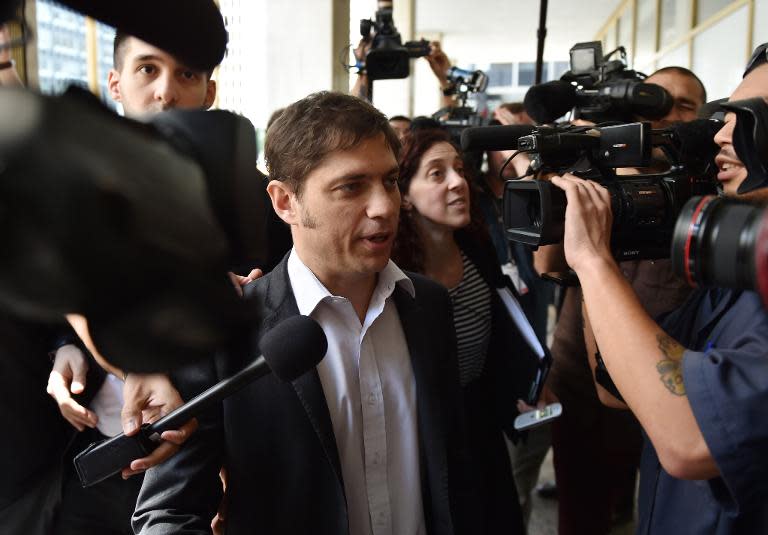 Argentine Economy Minister Axel Kicillof arrives at the office building of mediator Daniel Pollack on July 30, 2014 in New York