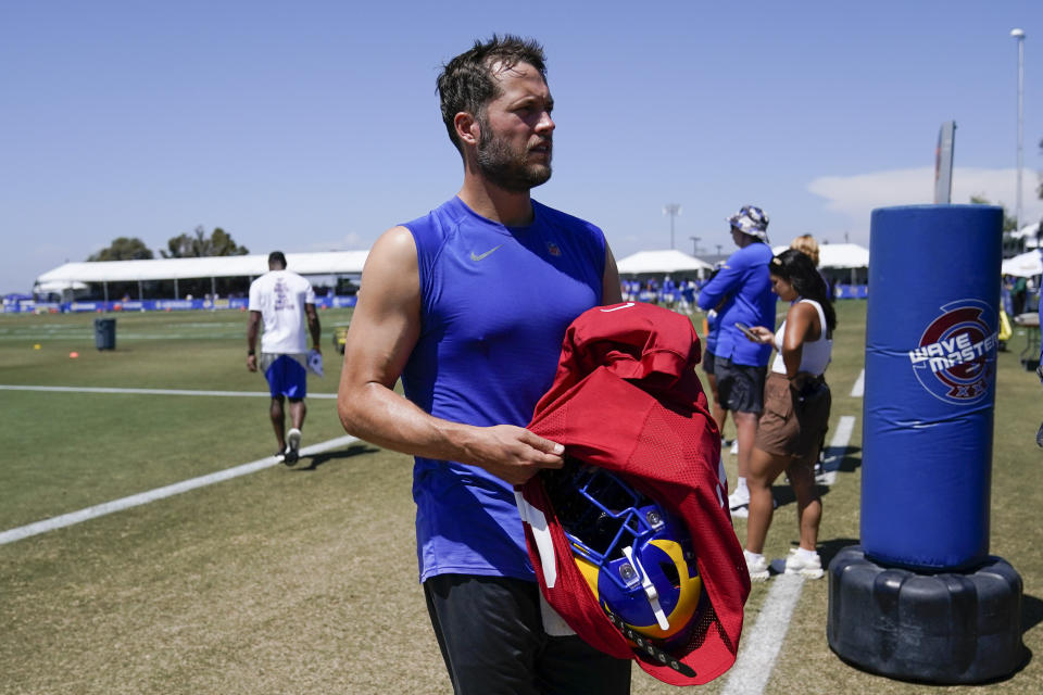 Los Angeles Rams quarterback Matthew Stafford (9) participates in drills at the NFL football team's practice facility in Irvine, Calif. Monday, Aug. 8, 2022. (AP Photo/Ashley Landis)