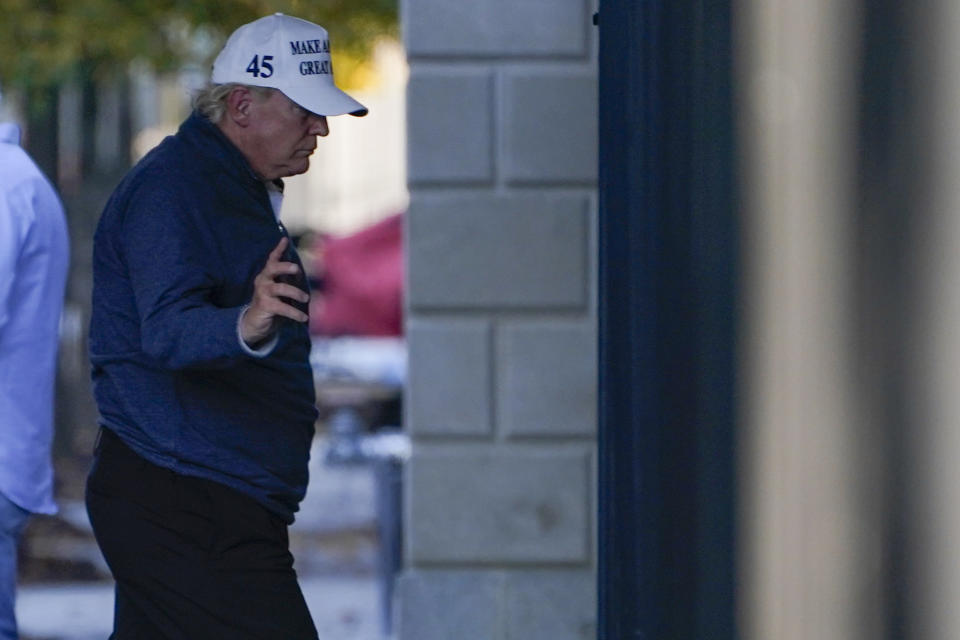 President Donald Trump arrives at the White House after golfing Saturday, Nov. 7, 2020, in Washington. (AP Photo/Evan Vucci)