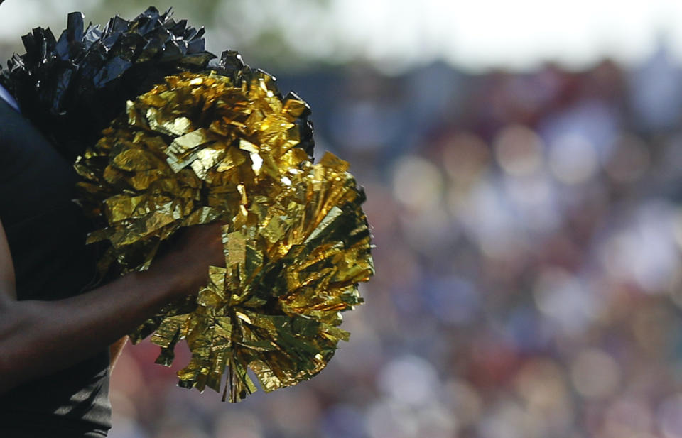 A cheerleader kicked off the Ottawa University cheer team said the team's coach went on a racist rant against her because of her hair. (Photo by Jamie Gilliam/Icon Sportswire via Getty Images)