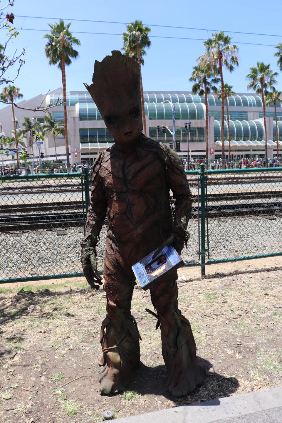 A cosplayer dressed as Groot from Marvel's Guardians of the Galaxy at San Diego Comic-Con 2022.