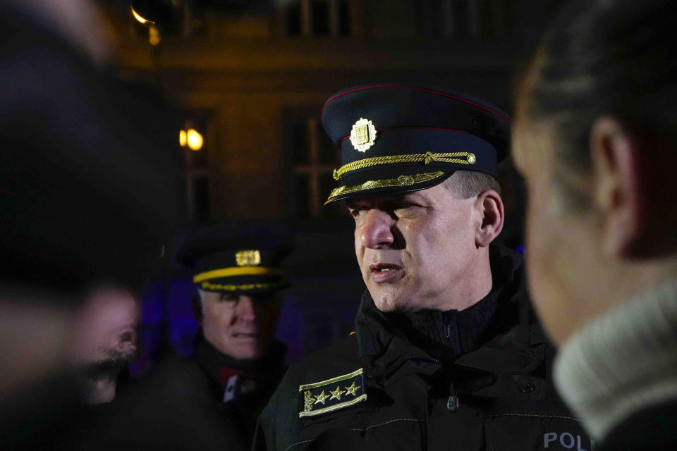 Czech Republic's Police officer Martin Vondrasek speaks to the media after a mass shooting in downtown Prague, Czech Republic, Thursday, Dec. 21, 2023. A mass shooting in downtown Prague killed several people and injured others, and the person who opened fire also is dead, Czech police and the city's rescue service said Thursday. (AP Photo/Petr David Josek)